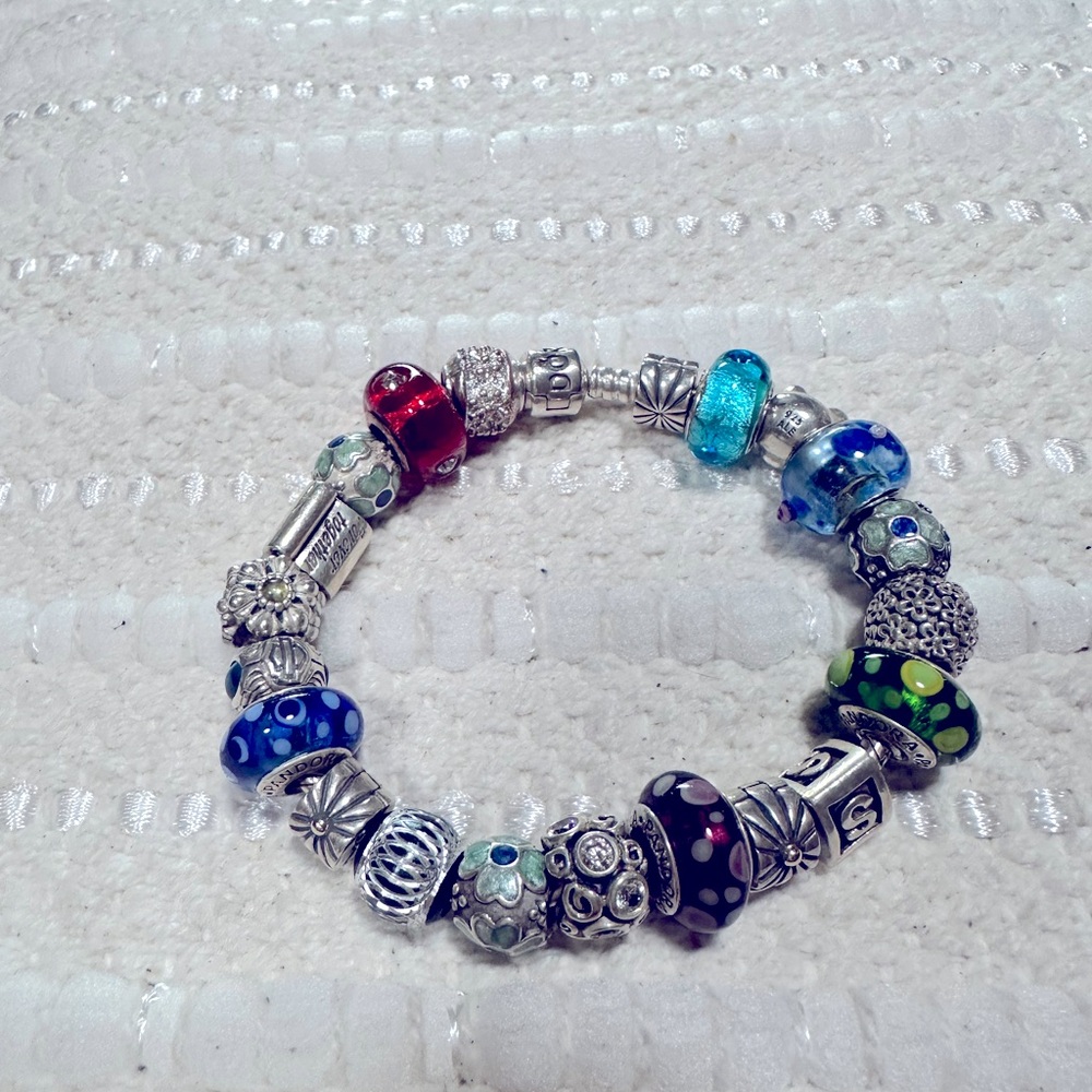 Gorgeous Pandora bracelet w/18 multiple colored crystal beads.Perfect condition